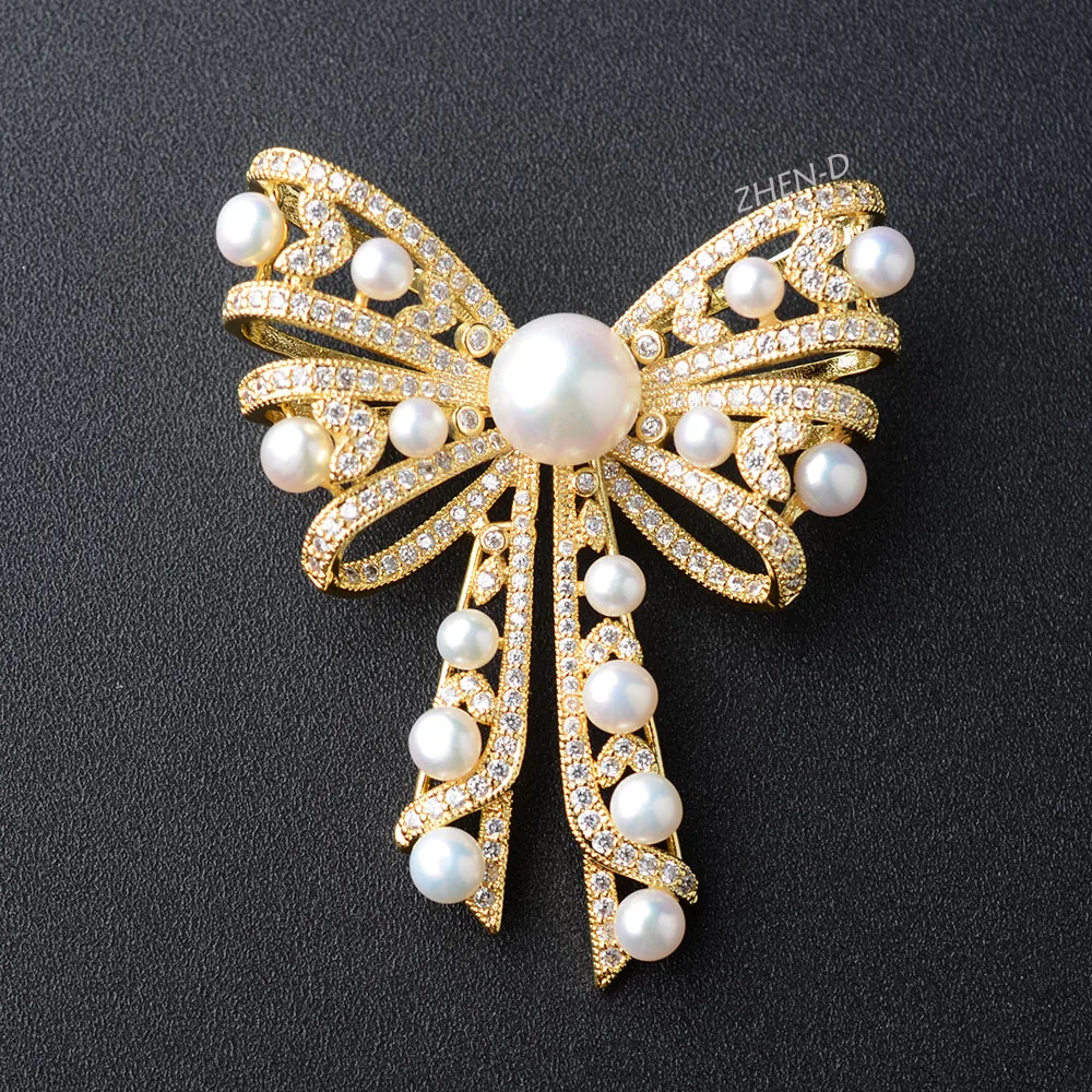 

ZHEN-D Jewelry Golden Big Classic Bow knot shaped Brooches Pins Freshwater akoya Pearls Shining CZ micro pave gift Lapel Pins