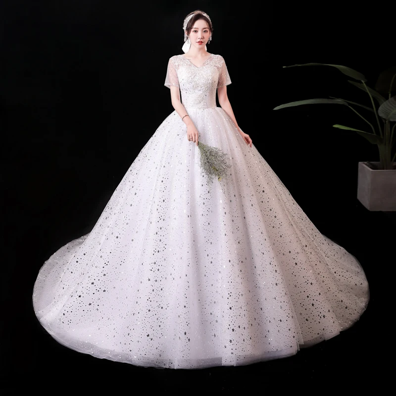 

Wedding Dresses Illusion V-Neck Short Sequined Embroidery Tulle Lace Backless Luxury White Vintage Nice Women Bridal Gown FB616