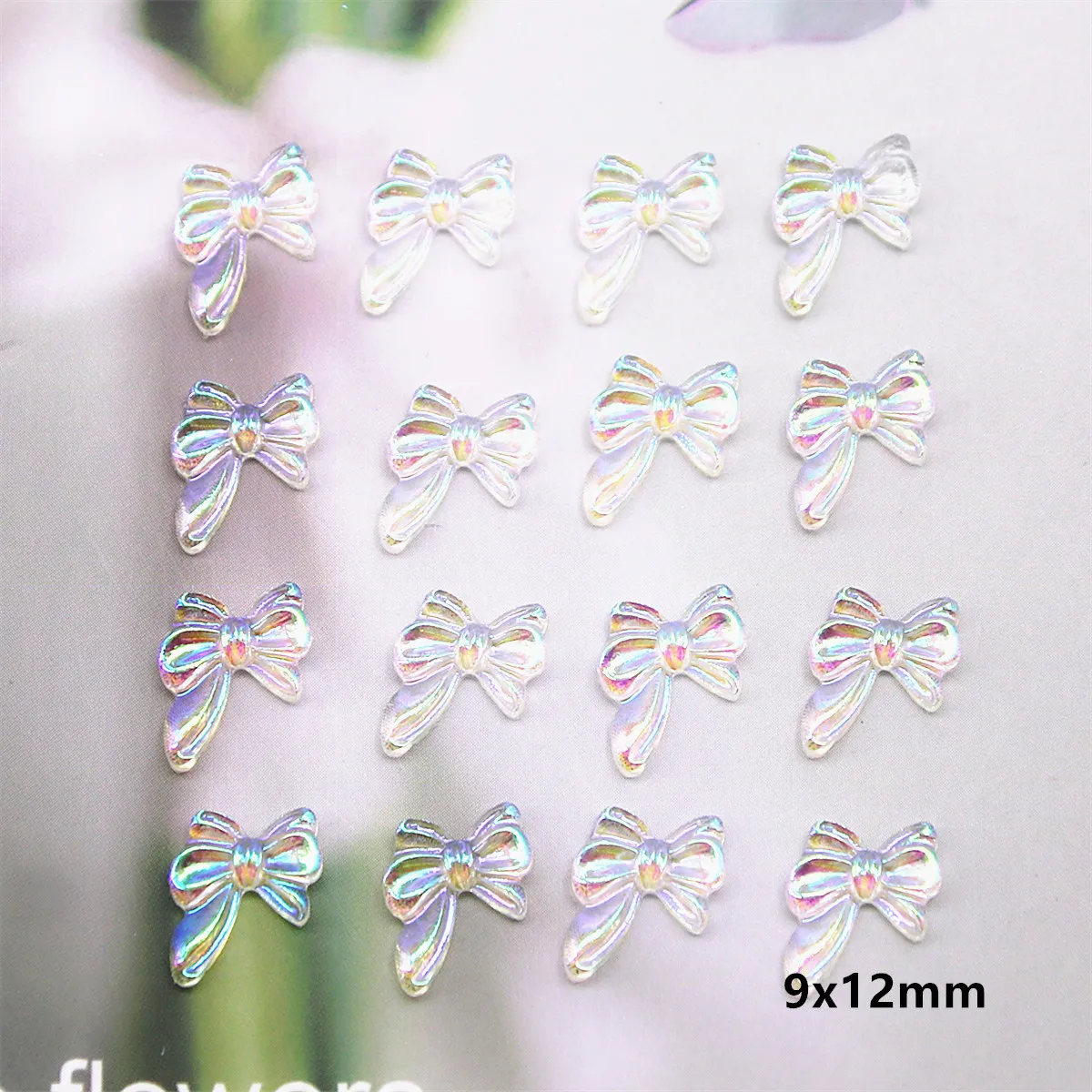 

100pcs Fashion Bowknot Resin Stones Nail Art Aurora Rhinestones Nail Jelly Ornaments For Manicure Tips 9x12mm