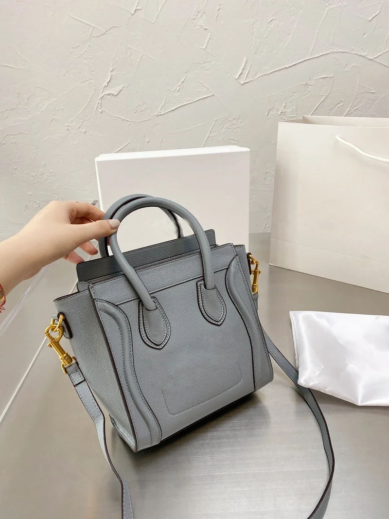 

101428 101856 Women's new funny and lovely smiling face bag handbag diagonal cross bag