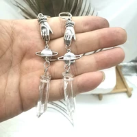 new handmadesaturnia earrings victorian hand earrings crystal point saturn earrings mystical earrings