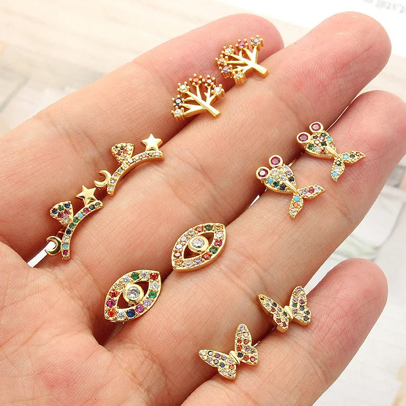 Разнообразные серьги-гвоздики с фианитами радужные золотые лебеди буквы бабочки