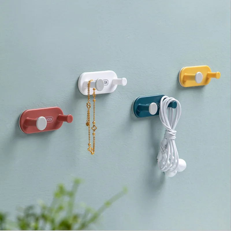 

Practical Punch-Free HookHooksStrong Adhesive Punch-free Plastic Double Hooks Home Multi-Purpose Storage Hooks