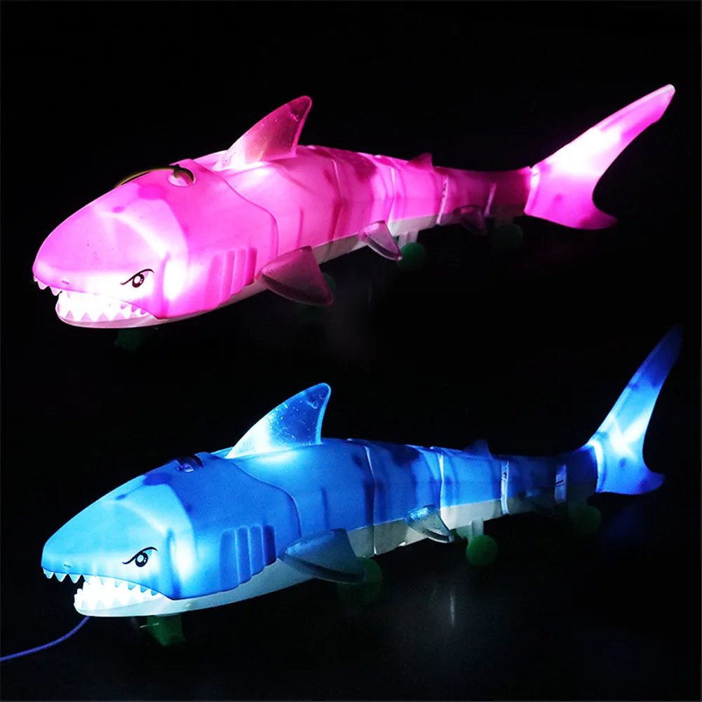 

Electric Light Music LED Shark Toy Air Glow Fish rolling wheel Shark toys Illuminate Kids Toys birthday gift well-suited