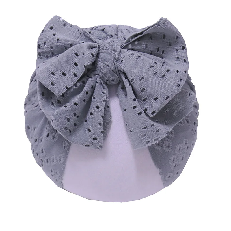 

2021 Newborn Baby Girl Hollow Bow Hat Solid Color Soft Infant Caps Toddler Beanie Breathable Indian Bonnets Turban Props