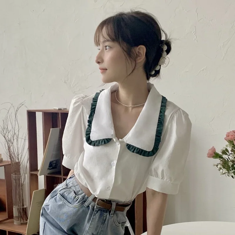 

Korejepo Women Shirt 2021 Summer French Sweet Temperament Doll Collar Gentle Age Reducing Single-Breasted Puff Sleeve Blouses