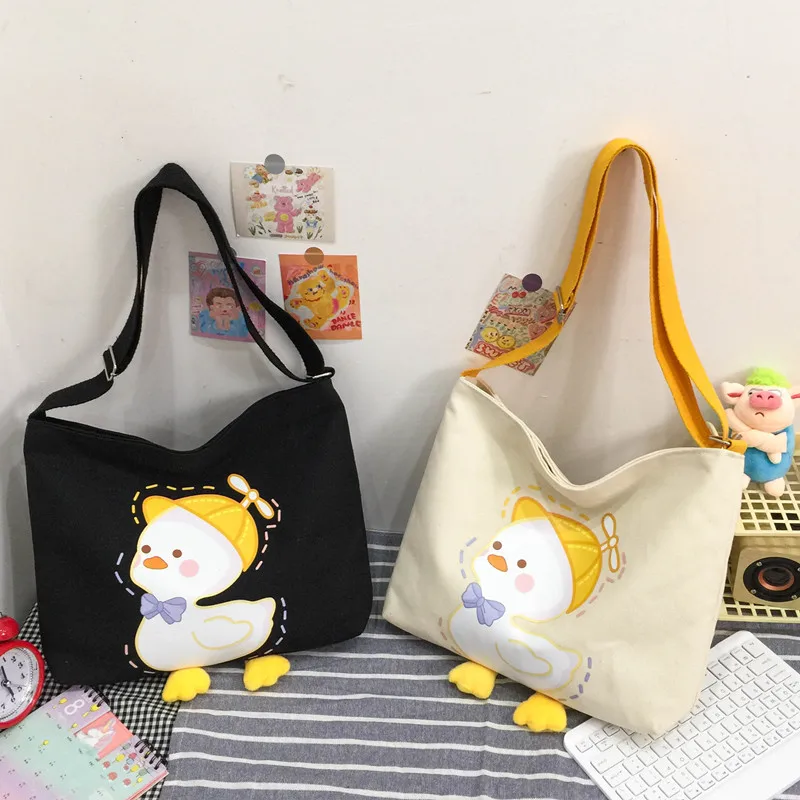 

South Korea wind large-capacity personality shoulder canvas bag Japanese Harajuku lovely soft girl student messenger bag.