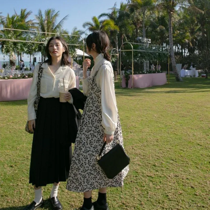 

2021 spring and summer new loose mid-length floral skirt retro temperament suspender dress women