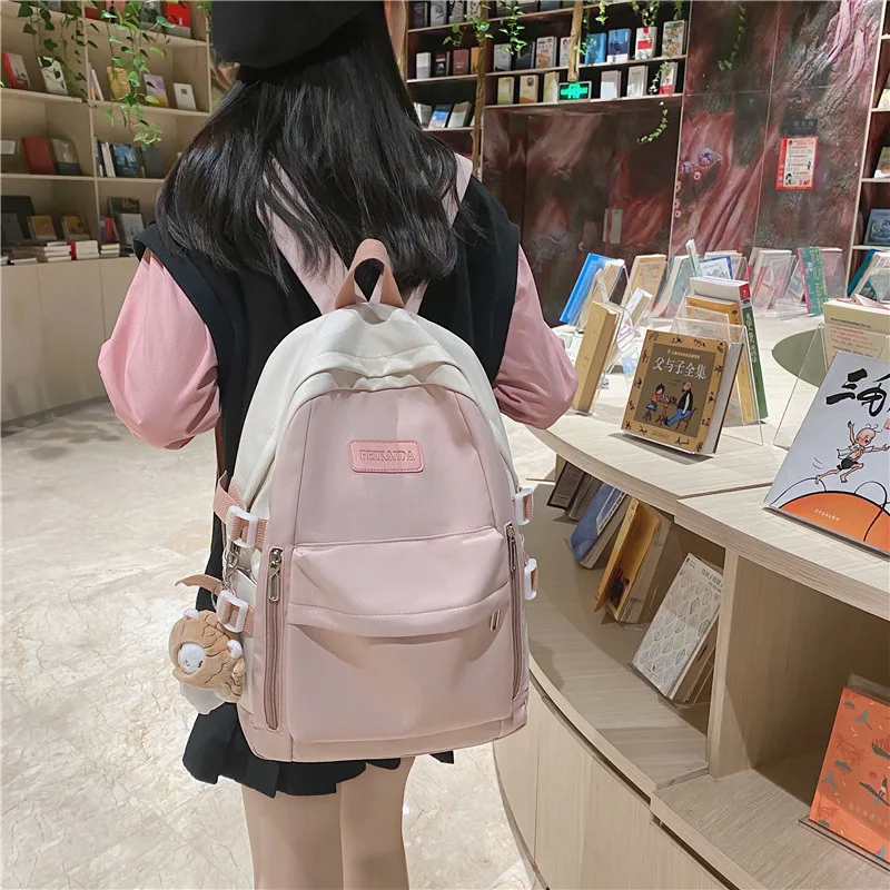 

Small fresh label decoration versatile color collision sweet girl backpack simple college style student large capacity schoolbag
