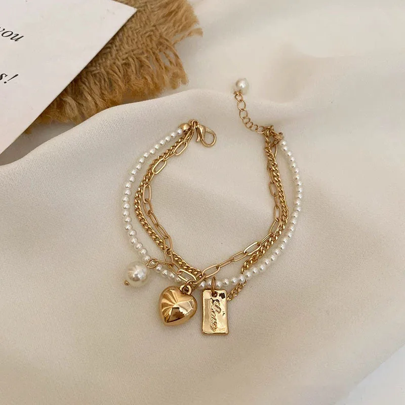 

Korean Version of The Pearl Love Double-Layer Bracelet Ins Niche Design Heart-Shaped Bracelet Temperament Simple Fashion Lady's