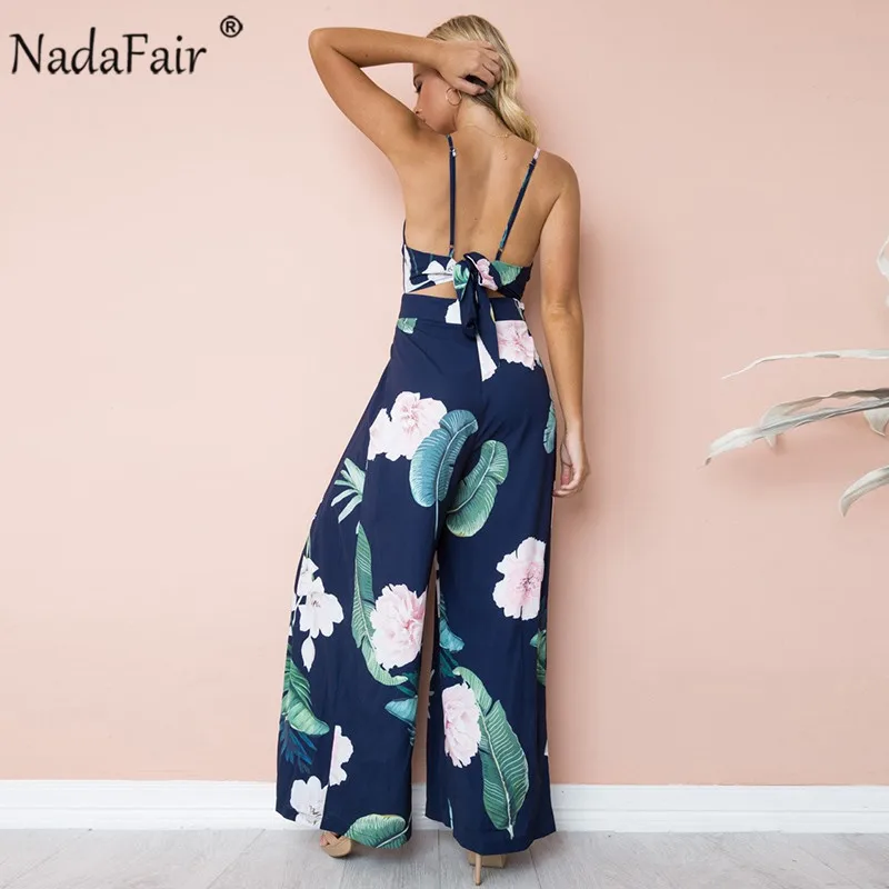 Nadafair Boho Цветочные Комбинезоны для женщин V образным вырезом спинки Лук ремень Летний Пляжный комбинезон длинные брюки