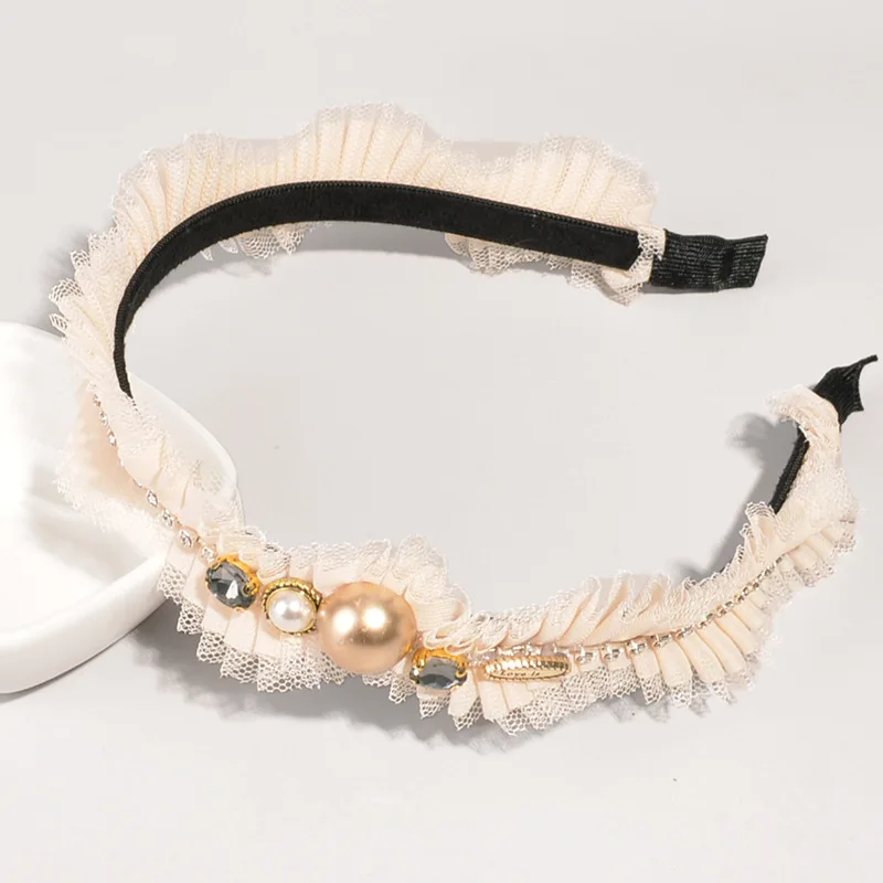 

The new Korean version of the new mesh pearl rhinestone hair band lady cute diamond crystal headband out hair pressure headdress