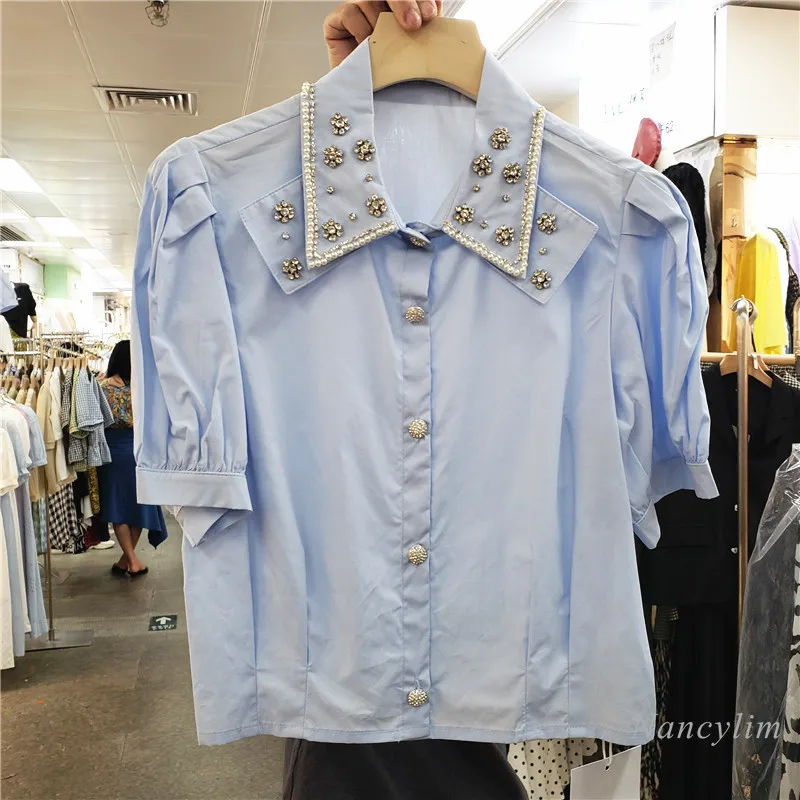 Chemise courte pour Femmes 2021 Été Nouveau Simple Boutonnage Manches Bouffantes Exquis Strass Revers Tout-Assorti Haut Court Dame Blusas