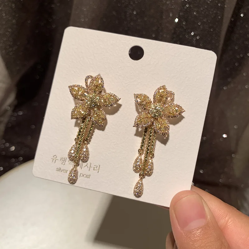 

Three-dimensional flower earrings long water tassels elegant retro exaggerated personality bridal earrings
