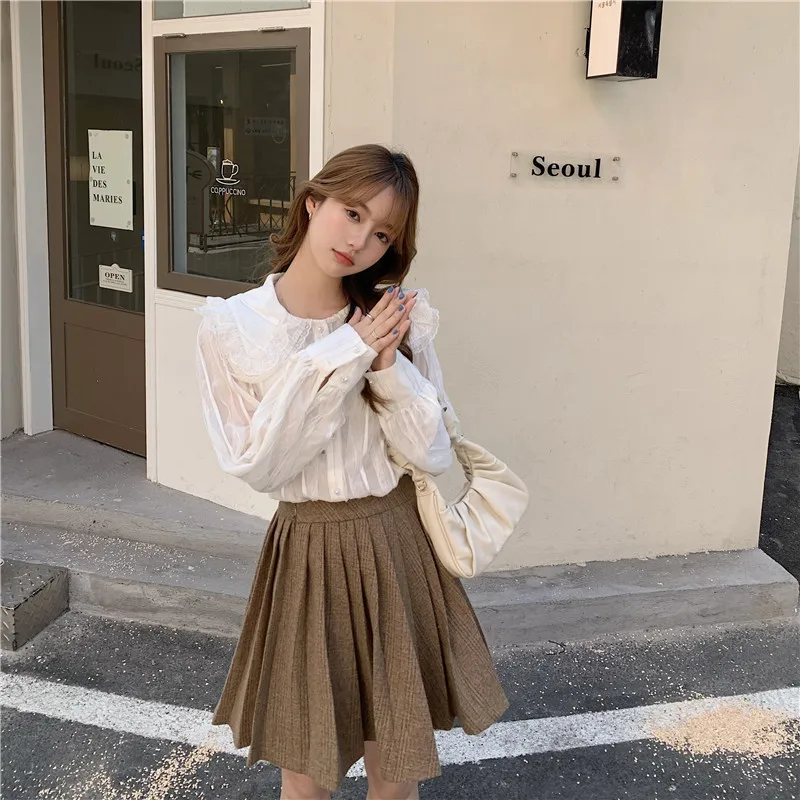 

Lace doll collar 2021 early spring new single-breasted sweet solid color French long-sleeved chiffon shirt