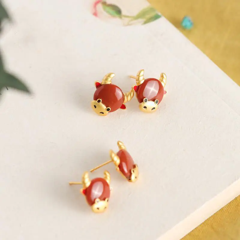 

Designer unique creative South red tourmaline zodiac bull ear studs elegant charm creative retro female silver jewelry