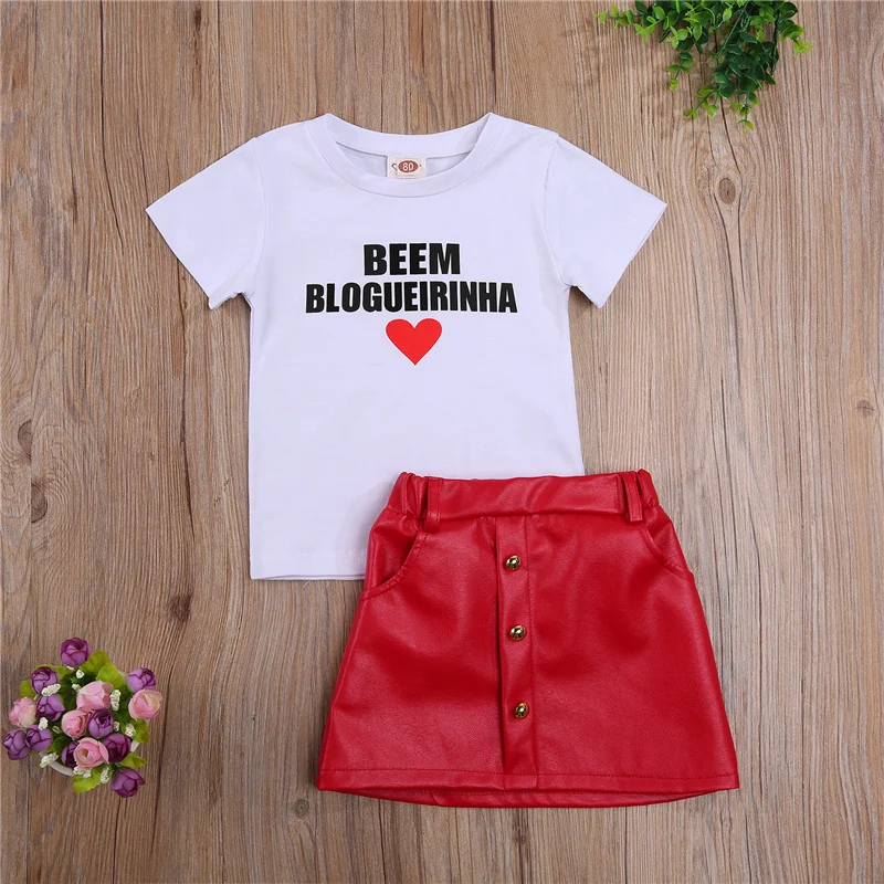 

Toddler Baby Letter Printing Two-pieces Set, Infant Girl's O-neck Short Sleeve Tops + High Waist Leather Skirt Set