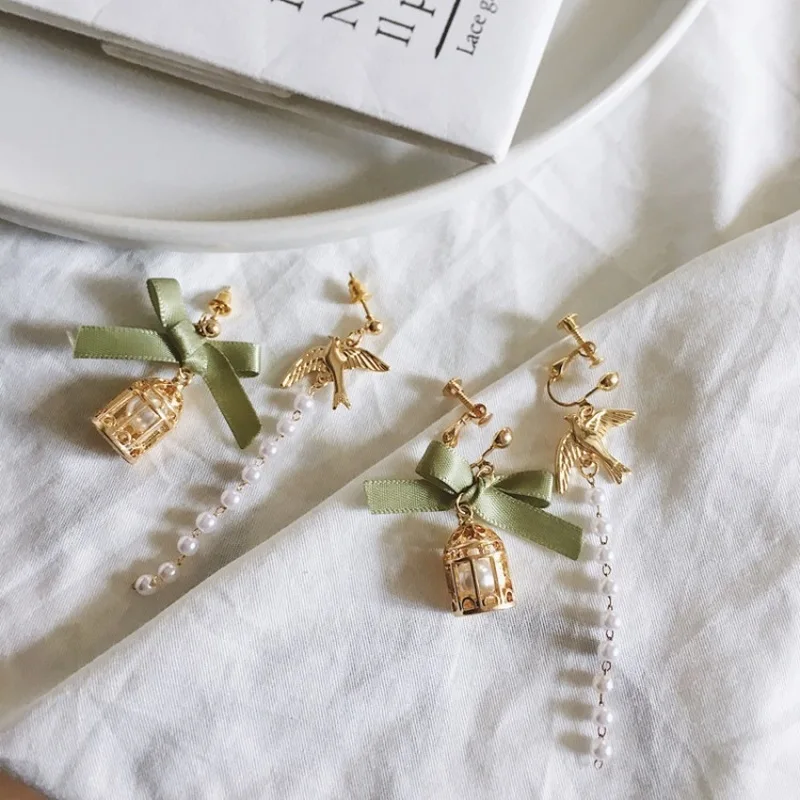 Модные корейские ювелирные изделия асимметричный бант клетка для птиц клипсы