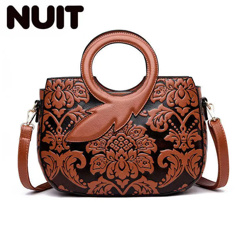 Кожаная женская сумка с тиснением в виде листьев через плечо цветочным рисунком