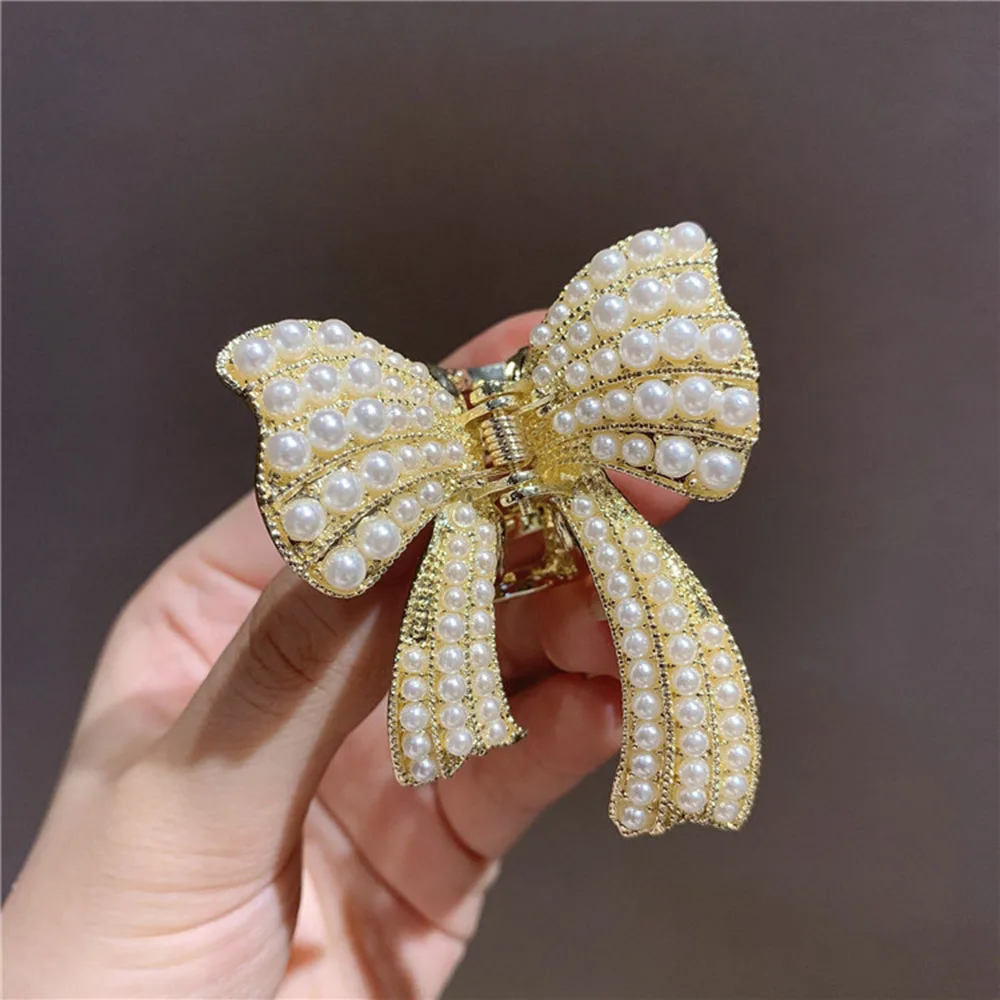 

Korean New Elegant Pearl Bow Lady’s Hair Accessories Gripping Hair Clip Girls Long Hair Refreshing Headdress For Woman in 2021