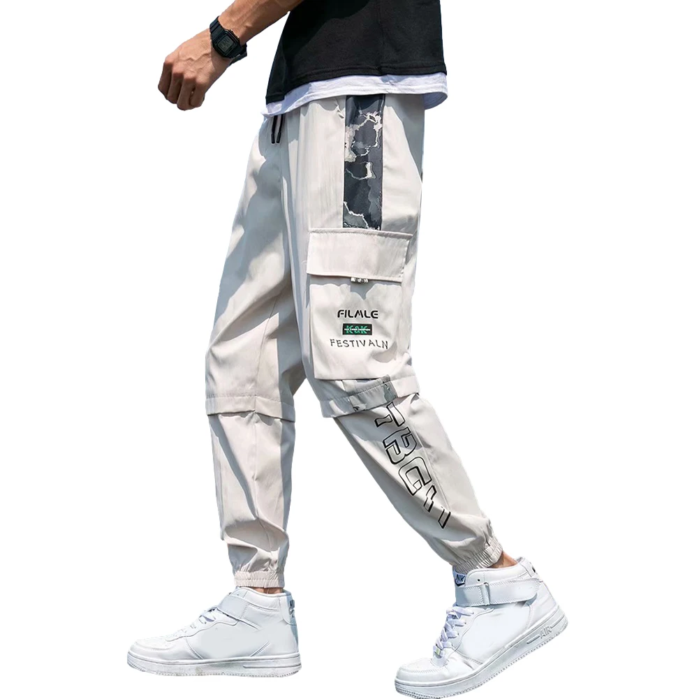

2021 New Hip Hop Streetwear Joggers Pants Men Drawstring Trousers Cotton Sports Pants Loose Splicing Sweatpants with Pockets