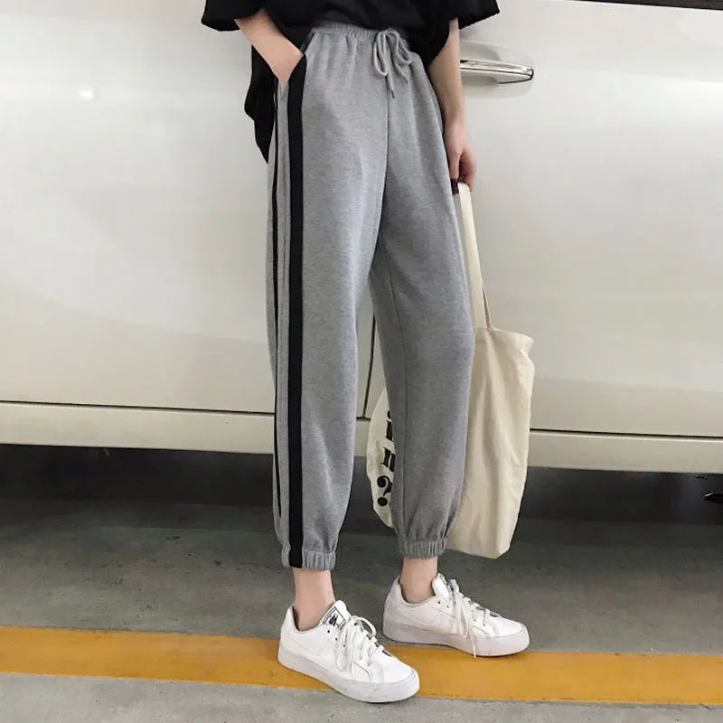 

Women's Side Stripe Casual Jogger Pants Plus Size Female Fashion Loose High Waist Drawstring Ninth Pants Korean Harem Trousers