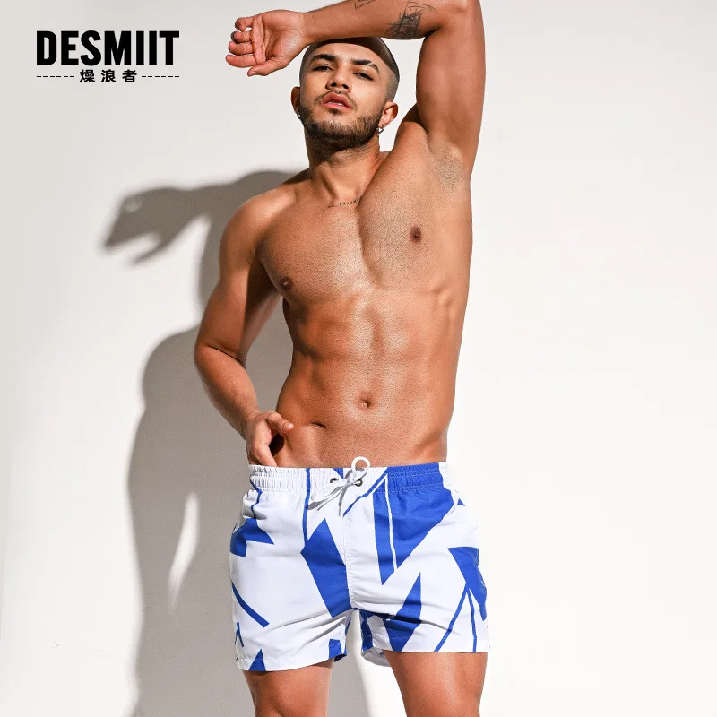 

Loose swimming trunks men's printed beach shorts two-point shorts casual shorts (B2102)