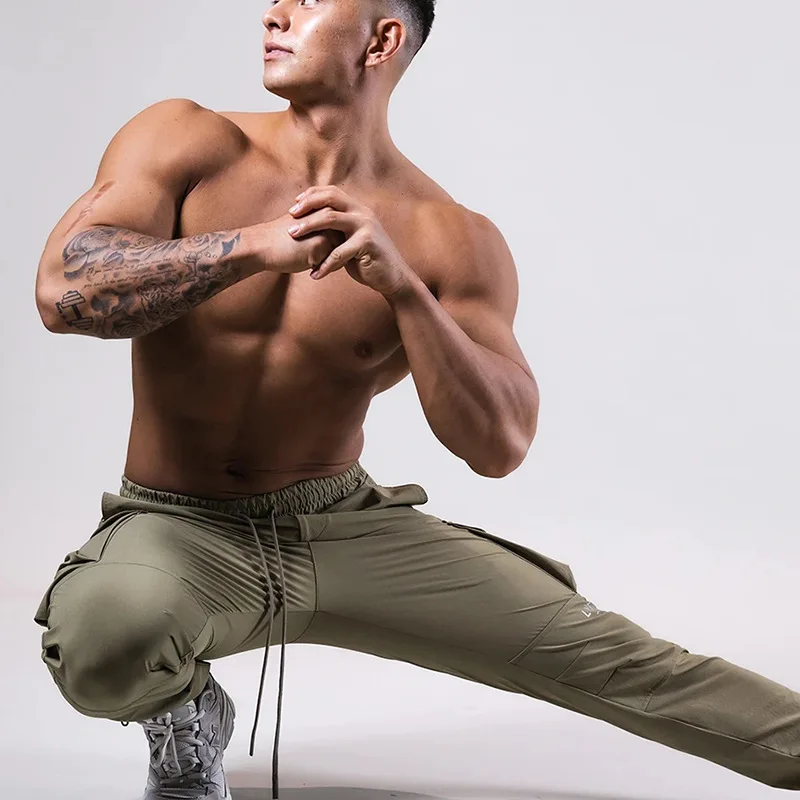 

2022 Spring And Autumn New Muscle Men Must-Have Fitness And Leisure Work Clothes Thin Elastic Beam Foot Running Training Pants