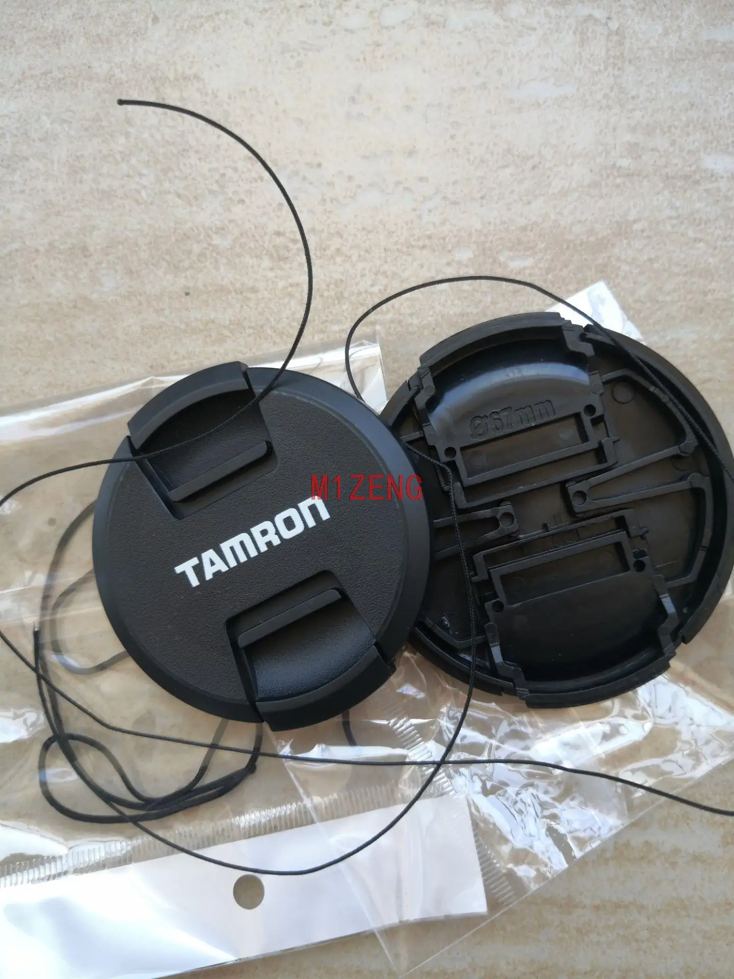 Центральная защелка на передней крышке объектива Защитная крышка с ремешком 49 62