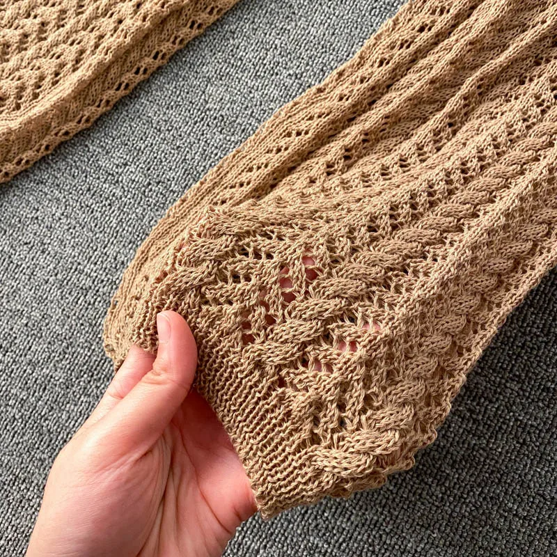 

Beach Holiday Knitted Suit Women's Summer 2021 Sexy Bikini Strap Halter Top Design Sense Of Hollow Knit Wide Leg Pants For Women