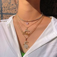 flatfoosie multilayer crystal butterfly dragon choker necklace for women golden pistol letter pendant necklace fashion jewelry