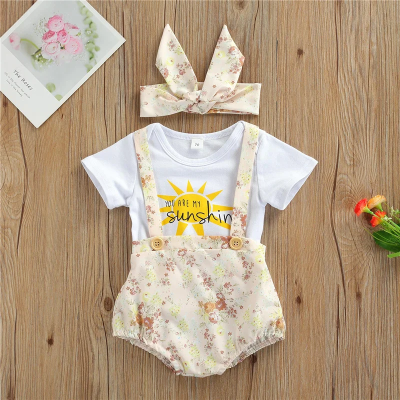 

3Pcs Newborn Girls Outfit, Summer Cotton Sun Letters Short Sleeve Romper + Floral Printing Suspender Shorts + Cute Bow Headwear