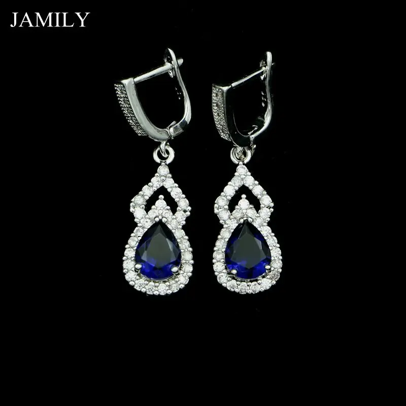 Модные серьги подвески из серебра 925 пробы с голубым фианитом и белыми