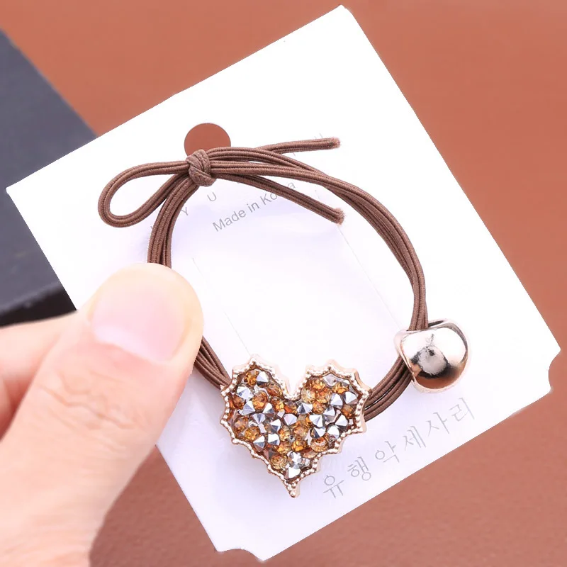 

Korean version of ins feng rhinestone brown love hair rope knotted rubber band high elasticity hair accessories source