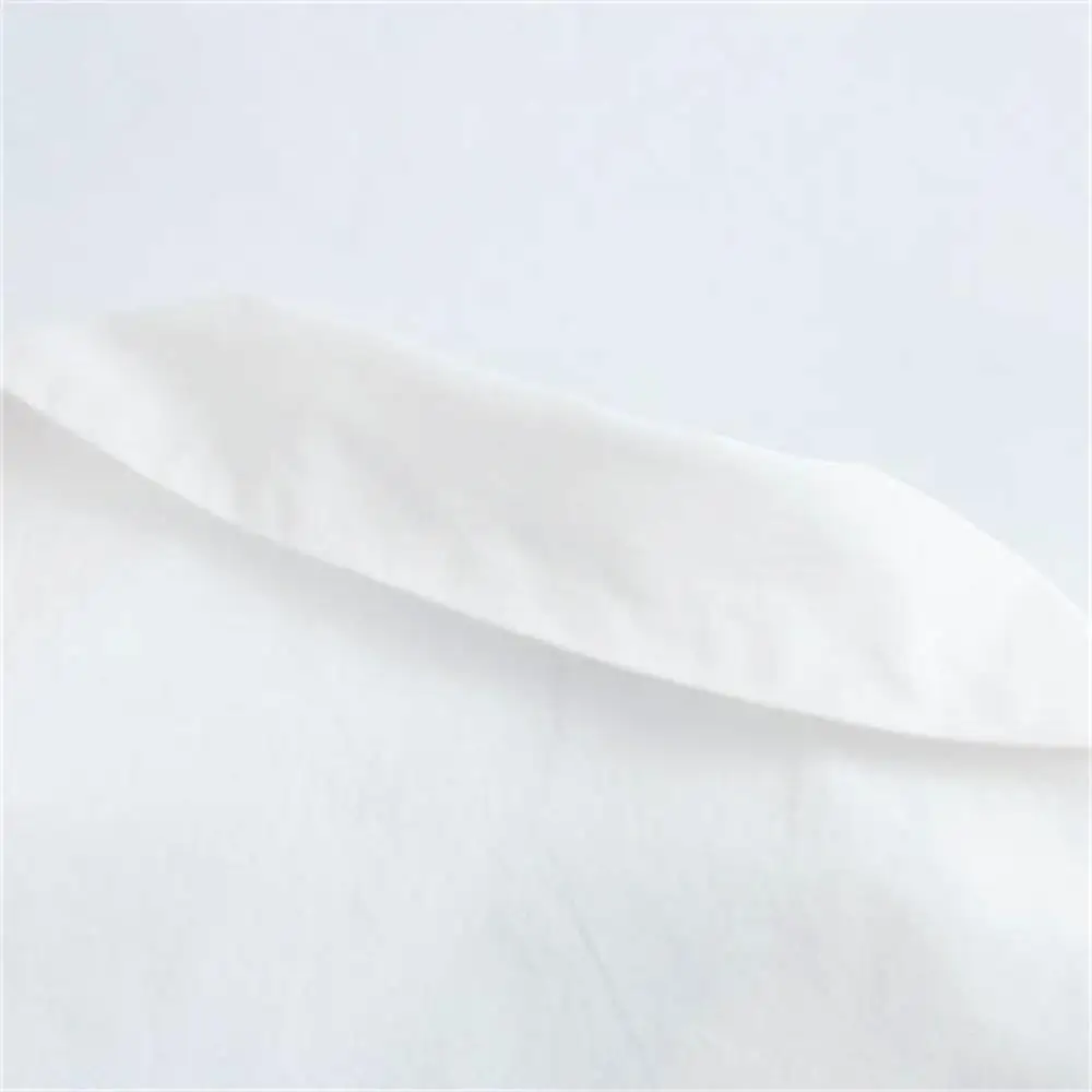 

2020 autumn new doll collar hollow embroidery stitching short hem drawstring white shirt