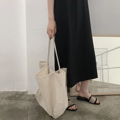 

2021 summer new flat-bottom woven tassel large size women's slippers simple and fashionable flat-heel women's shoes