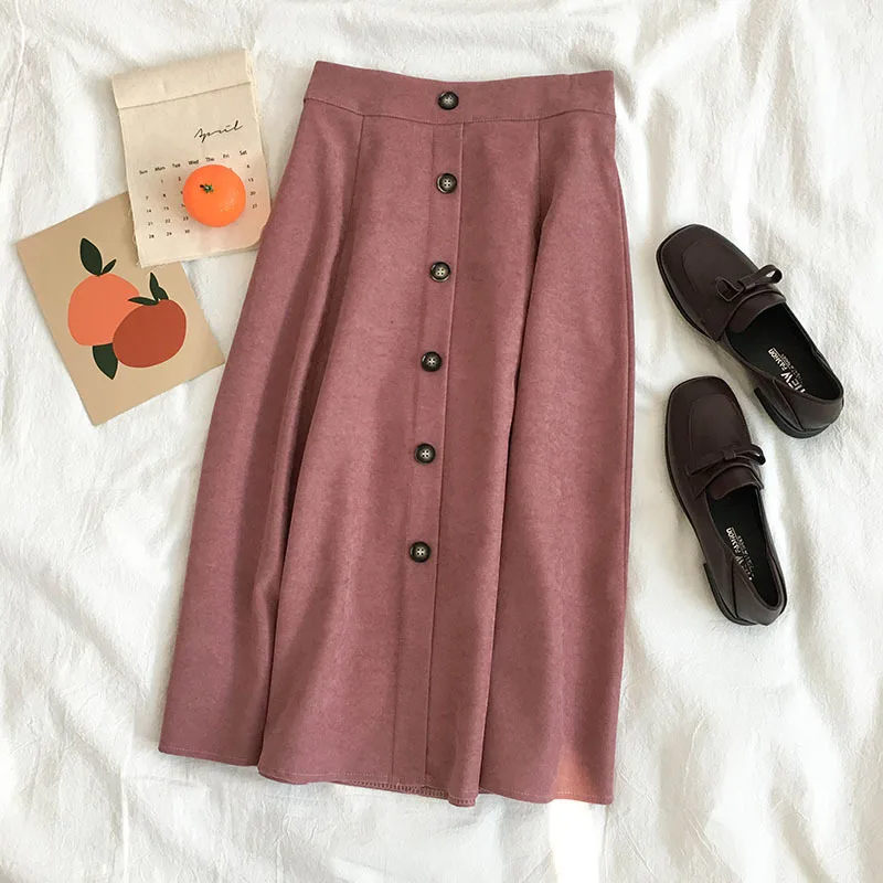 Женская замшевая юбка средней длины черная трапециевидная с завышенной талией и