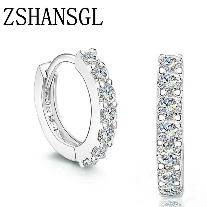 Женские серьги гвоздики из серебра 925 пробы маленькие с фианитами высокое