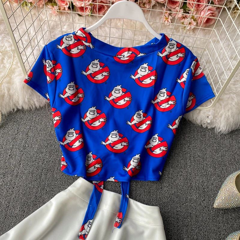 

Cheerleaders Girls Show Two Piece Skirt Set 2021 Summer Waist Cross Letter Printed Short T-shirt + White Mini Pleated Skirts