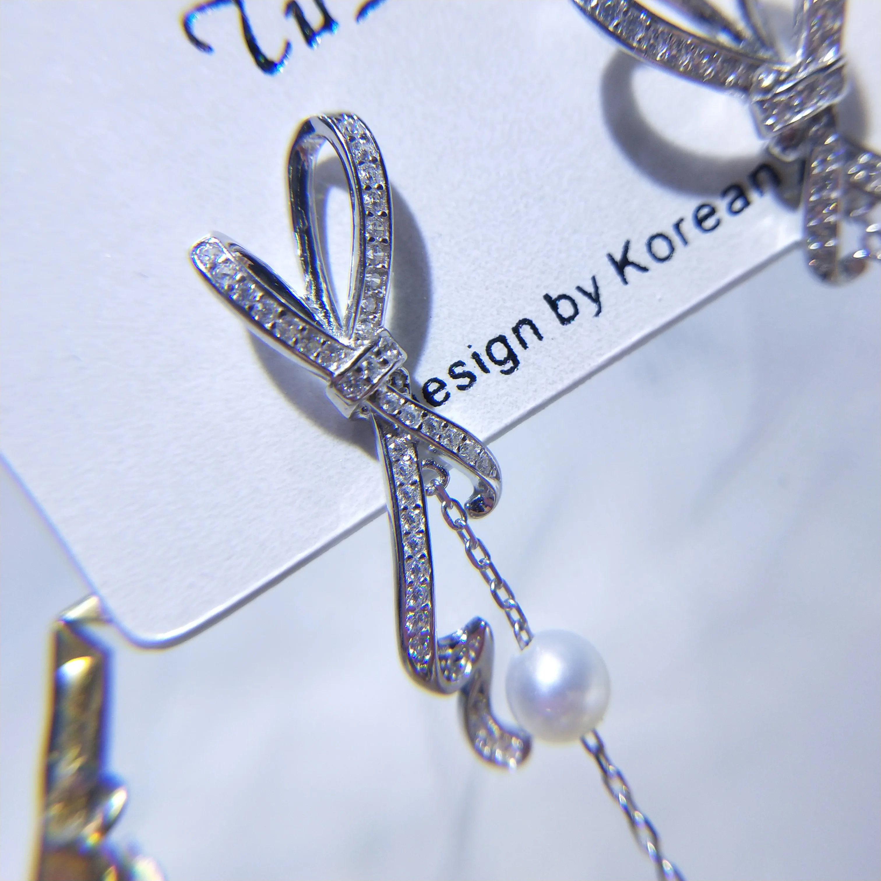 

Akoya ultra-strong light round earrings Silver and natural seawater pearl starry bow beautiful earrings