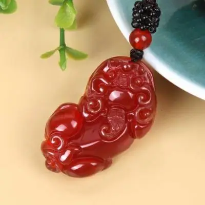 

Agate and jade pendant