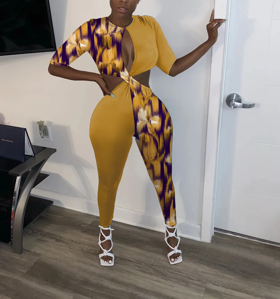 

FIXSYS Sexy Print Patchwork Hollow Out Jumpsuit Half Sleeve Twist Bodycon Romper Playsuits Club Overall Outdoor 2021 One Piece