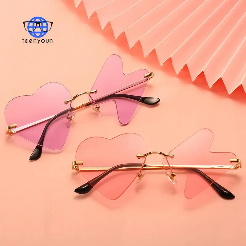 

TEENYOUN 2021 Frameless Love Heart Sunglasses For Women Men Luxury Brand Designer Love Heart Lightning Sun Glasses Oculos UV400