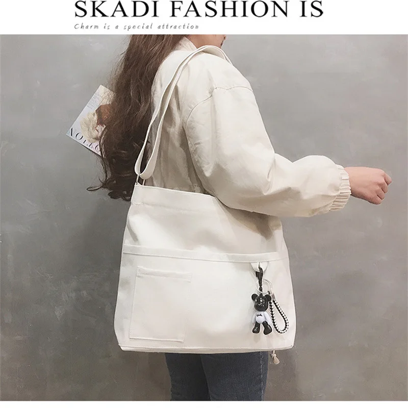 

New 2020 Ladies Messenger Canvas Art Bag Solid Color One-Shoulder Tutoring Backpack for College and Middle School Students.