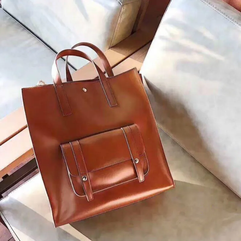 

Tidog Korean version of the sloping hand-held one-shoulder retro handbag