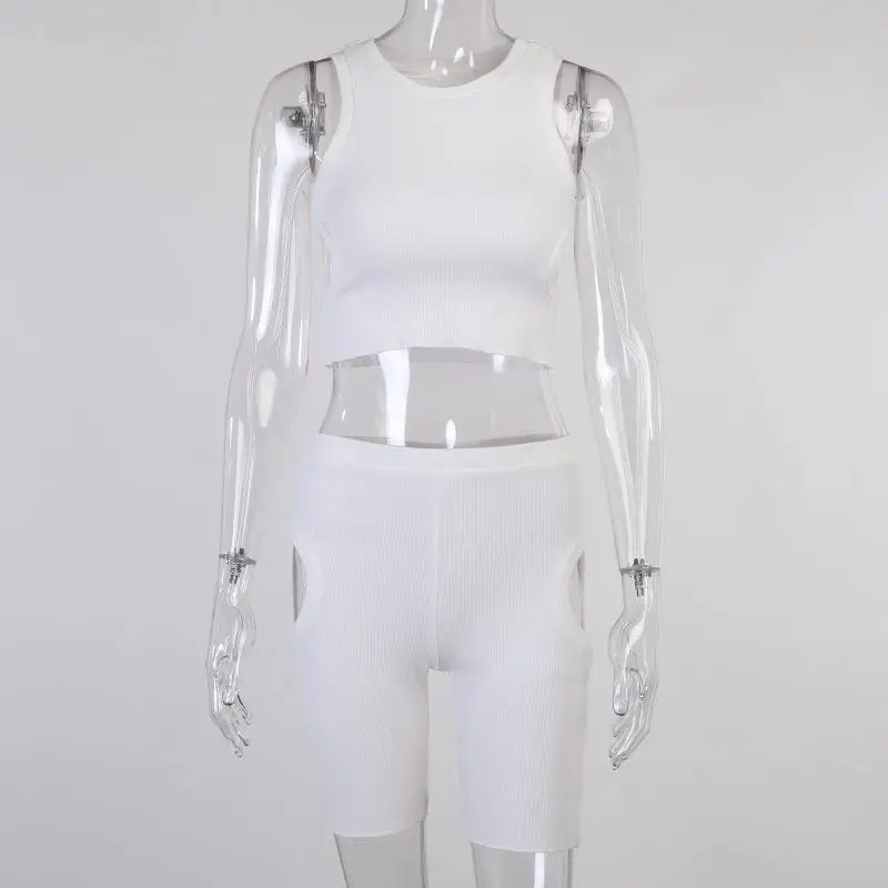 

Niche design black and white vest side hollow short top + sports shorts suit