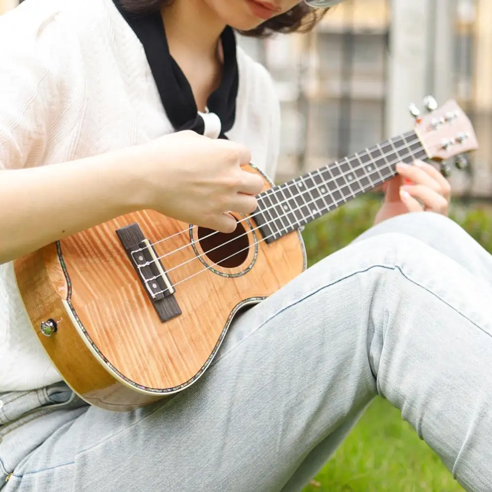 

23 Inch Veneer Mahogany Wood Ukulele Hawaiian Small Guitar Bevel Design with Gig Bag Capo Strings Cleaning Cloth