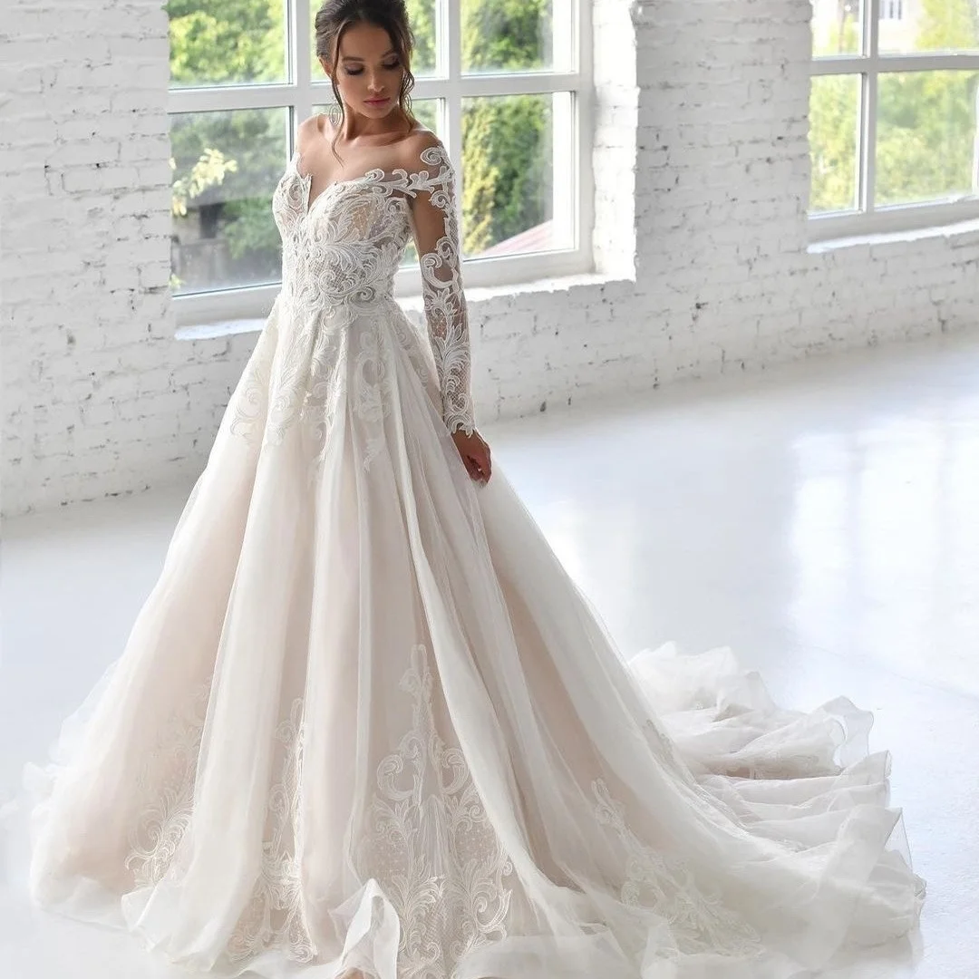 

2021 A Line Wedding Dresses Long Sleeves Lace Appliqued Tulle Bridal Gowns Buttons Back vestido de novia