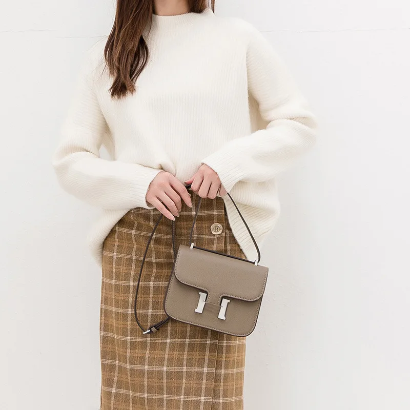 

2021 new fashion women's bag h button Single Shoulder Messenger Handbag simple stewardess bag women's tofu bag