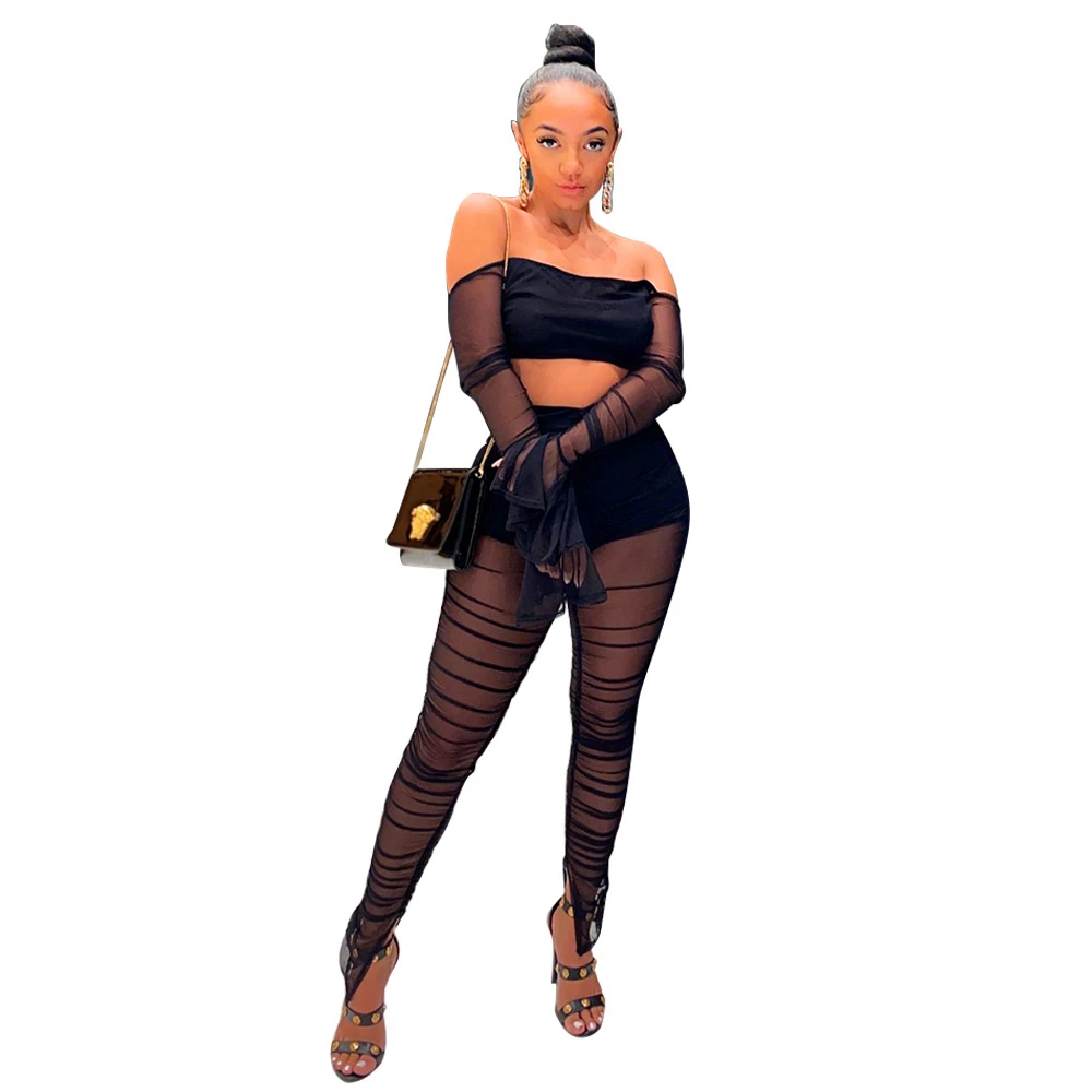 

A6631 European American spring and autumn hot women's wear perspective mesh trumpet sleeve split leg two piece set wholesale